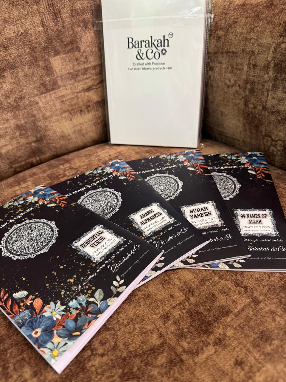 Close-up of traceable Quran workbooks included in the complete learning bundle